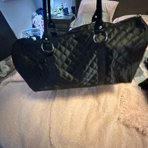 DSW black satin duffel bag.